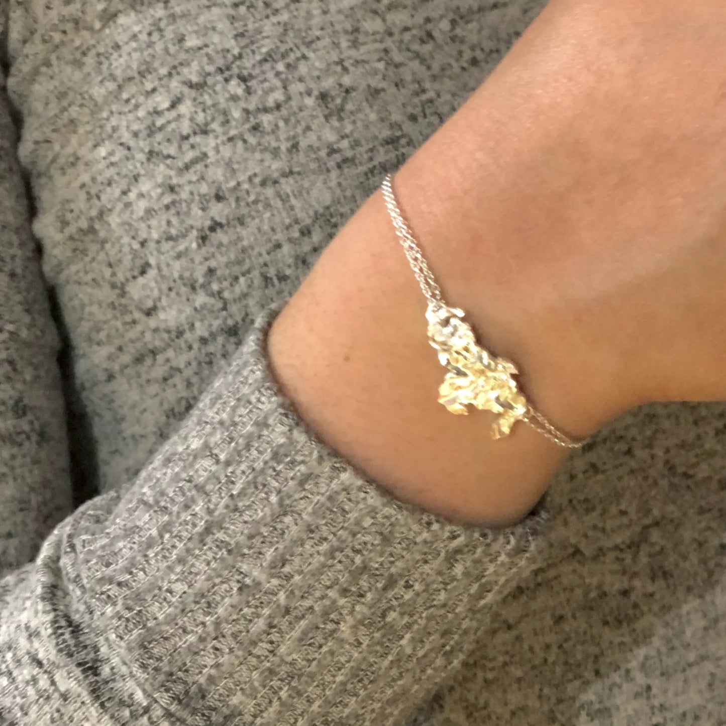 Luisana Jewelry Venezuela Bracelet Texture showcasing intricate design on a wrist in casual attire