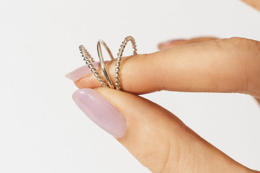 Artisan showcasing a low-impact ring, emphasizing craftsmanship in low impact ring production