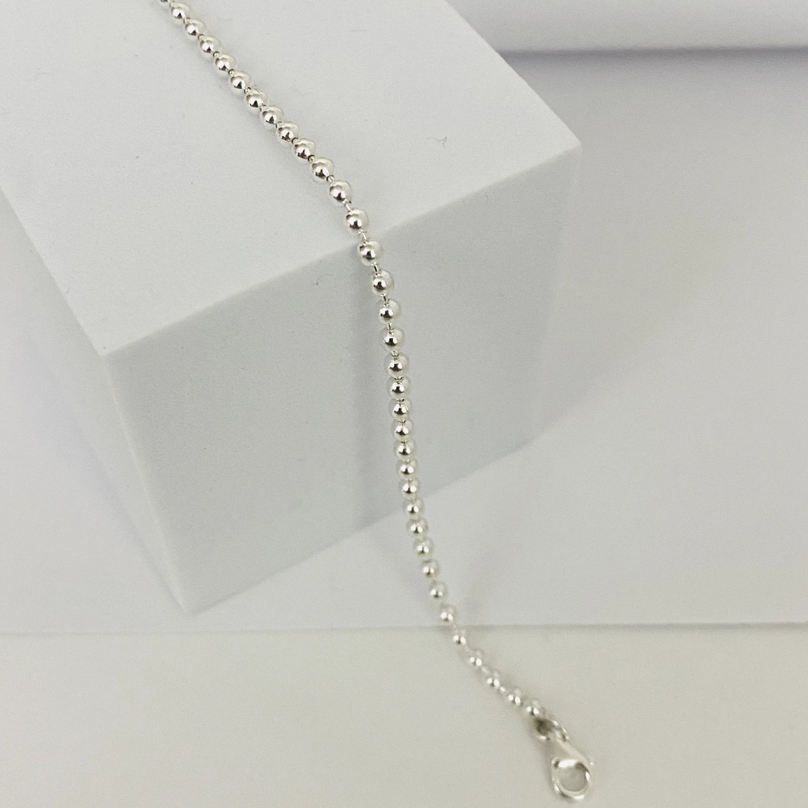 Luisana Jewelry silver bead bracelet on a white display box showcasing its elegant design
