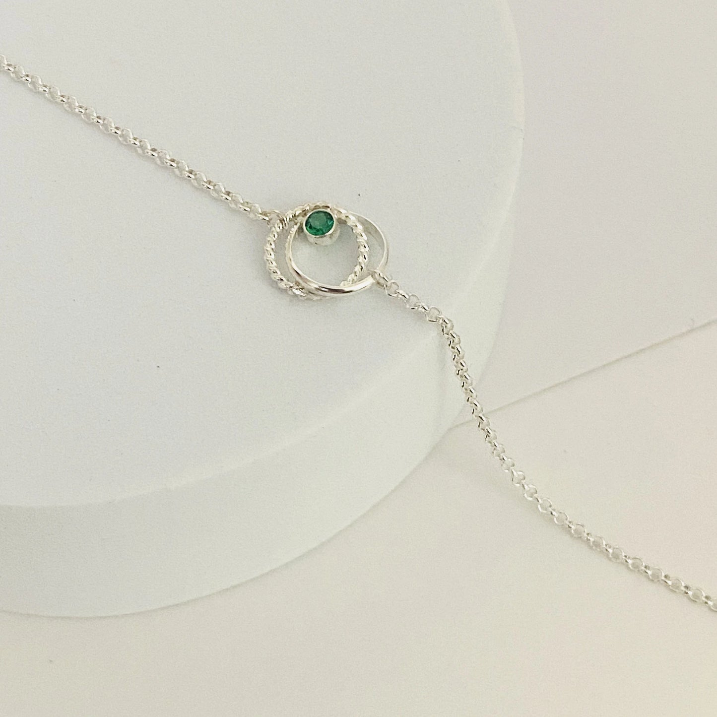 Luisana Jewelry silver bond bracelet featuring a delicate design with a green gemstone accent
