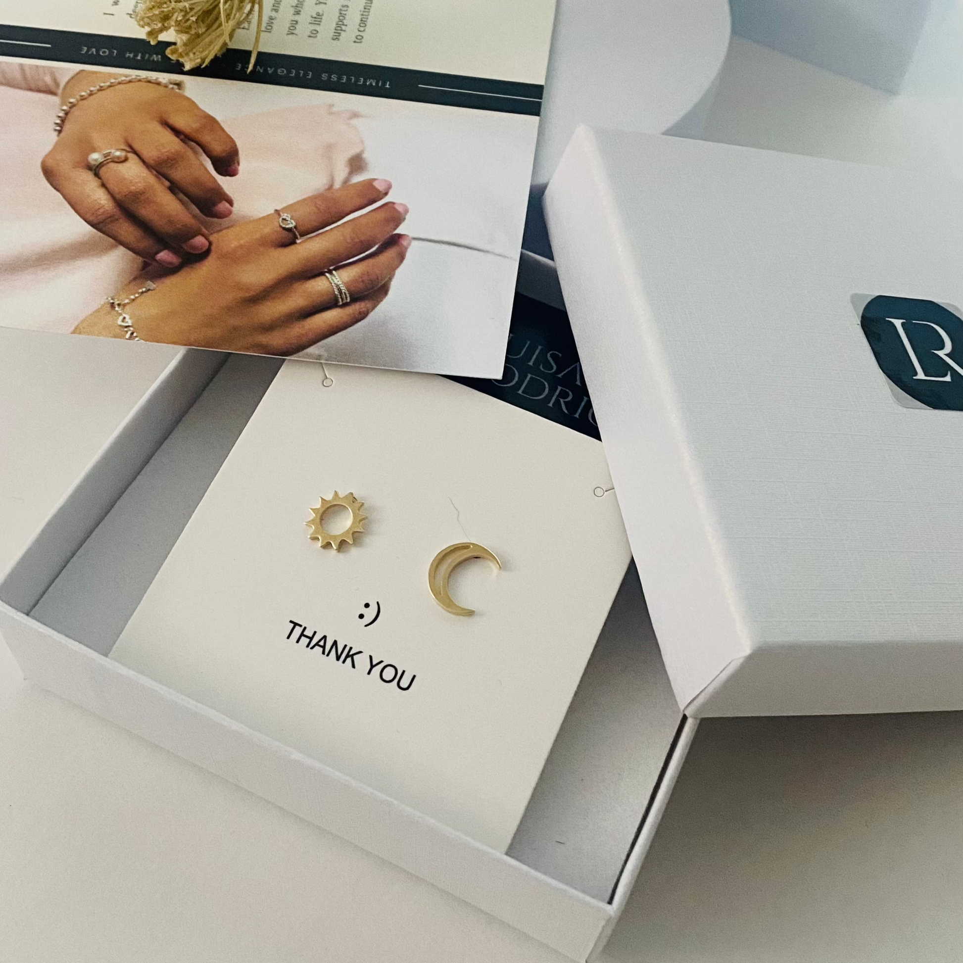 Luisana Jewelry Celestial Studs in a gift box featuring sun and moon design for elegant style