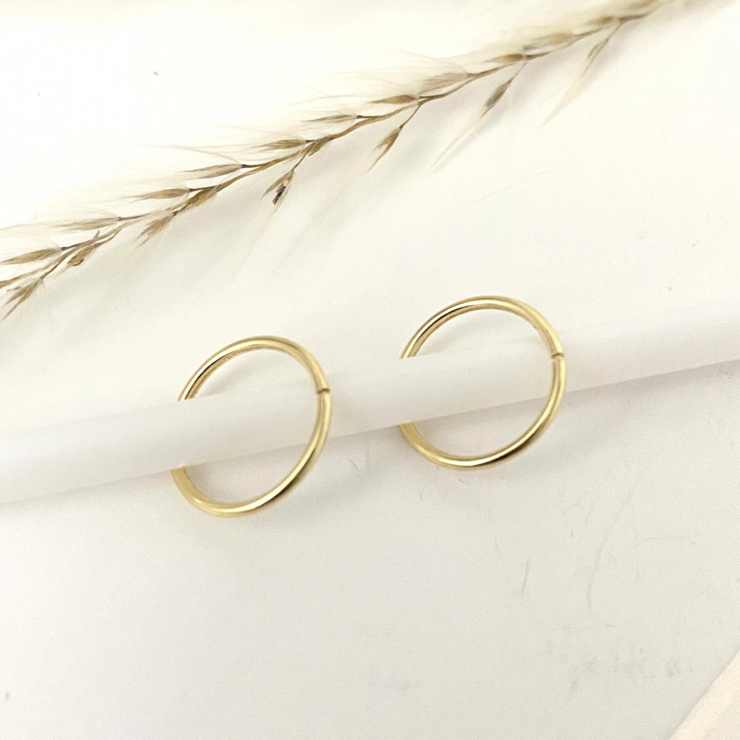 Elegant gold Clara Hoops earrings designed for everyday wear and versatile styling