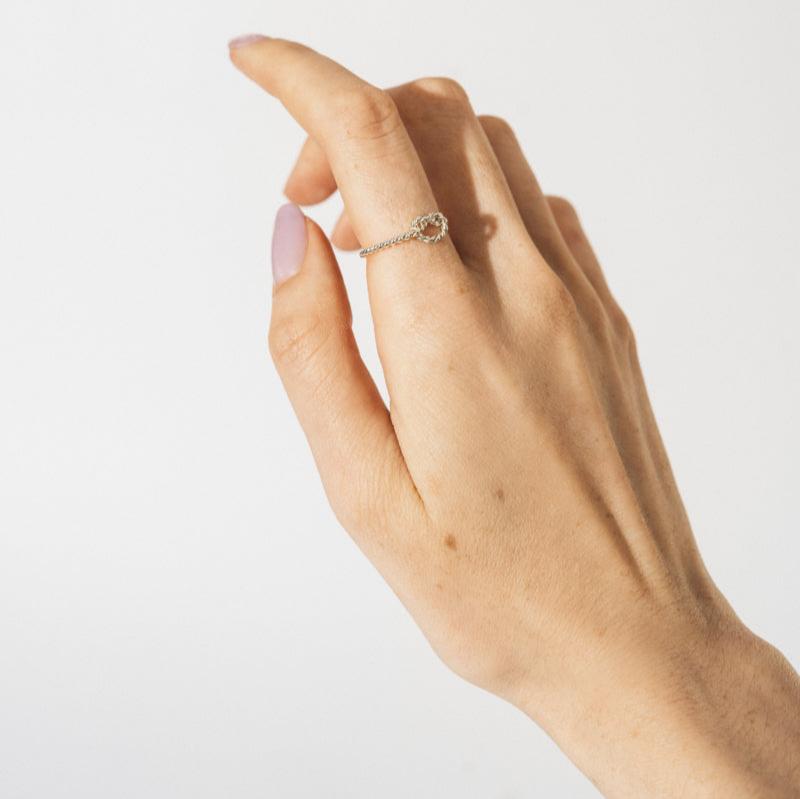 Elegant Endless Ring displayed on a woman's hand with a delicate design for stylish accessories