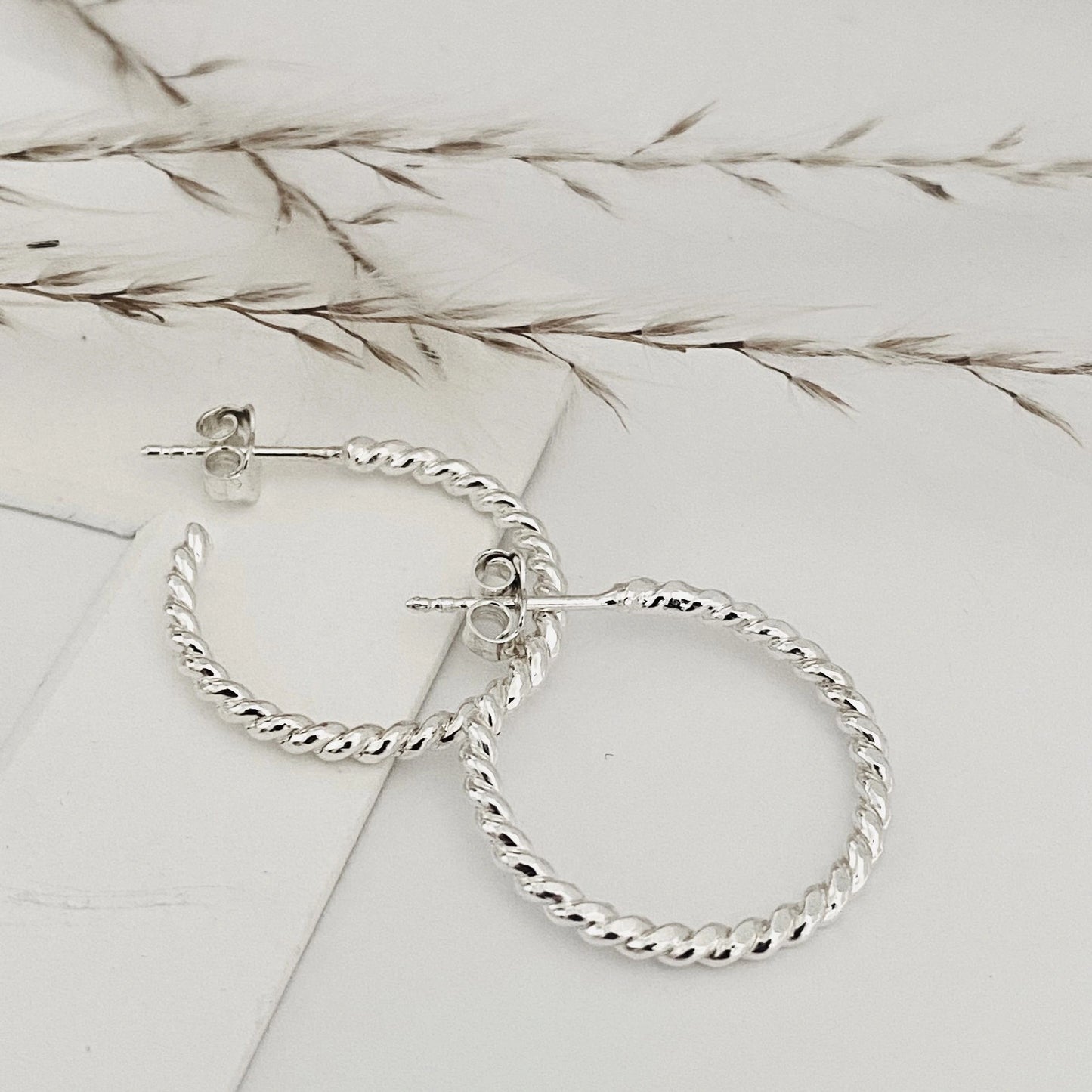 Fiona Hoops by Luisana Jewelry featuring elegant twisted silver design for everyday wear