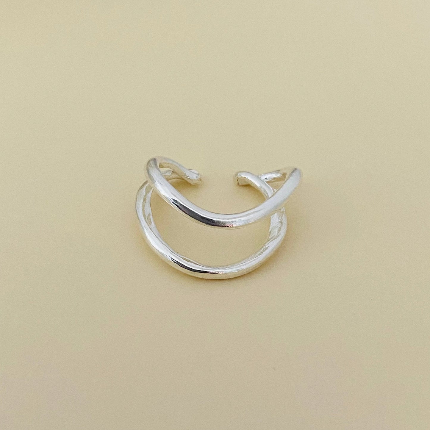 Luisana Jewelry Flow Ear Cuff in Silver with a Unique Twisted Design for Stylish Ear Accessories