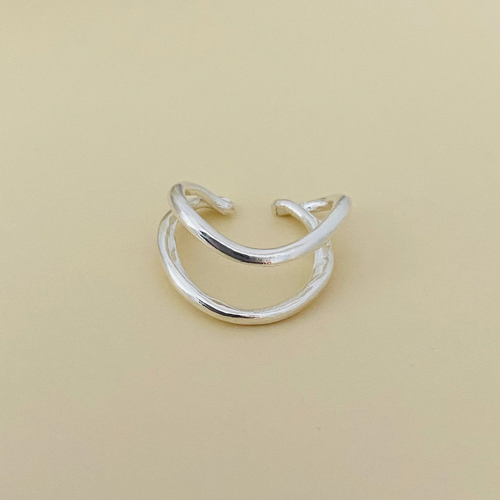 Luisana Jewelry Flow Ear Cuff in Silver with a Unique Twisted Design for Stylish Ear Accessories