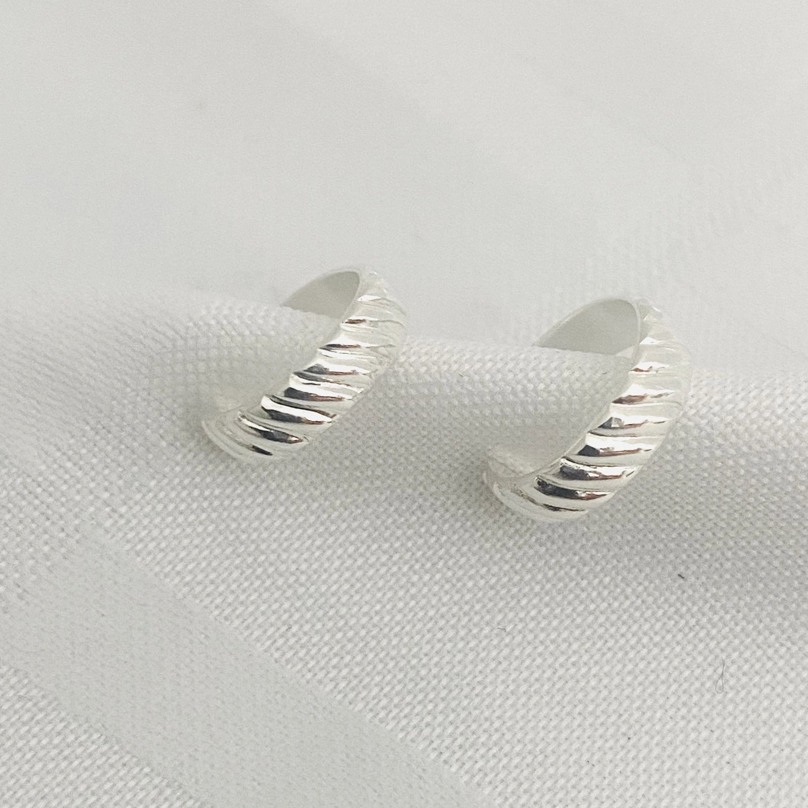 Luisana Jewelry Grace ear cuff in silver with a stylish twisted design for elegant ear accessories