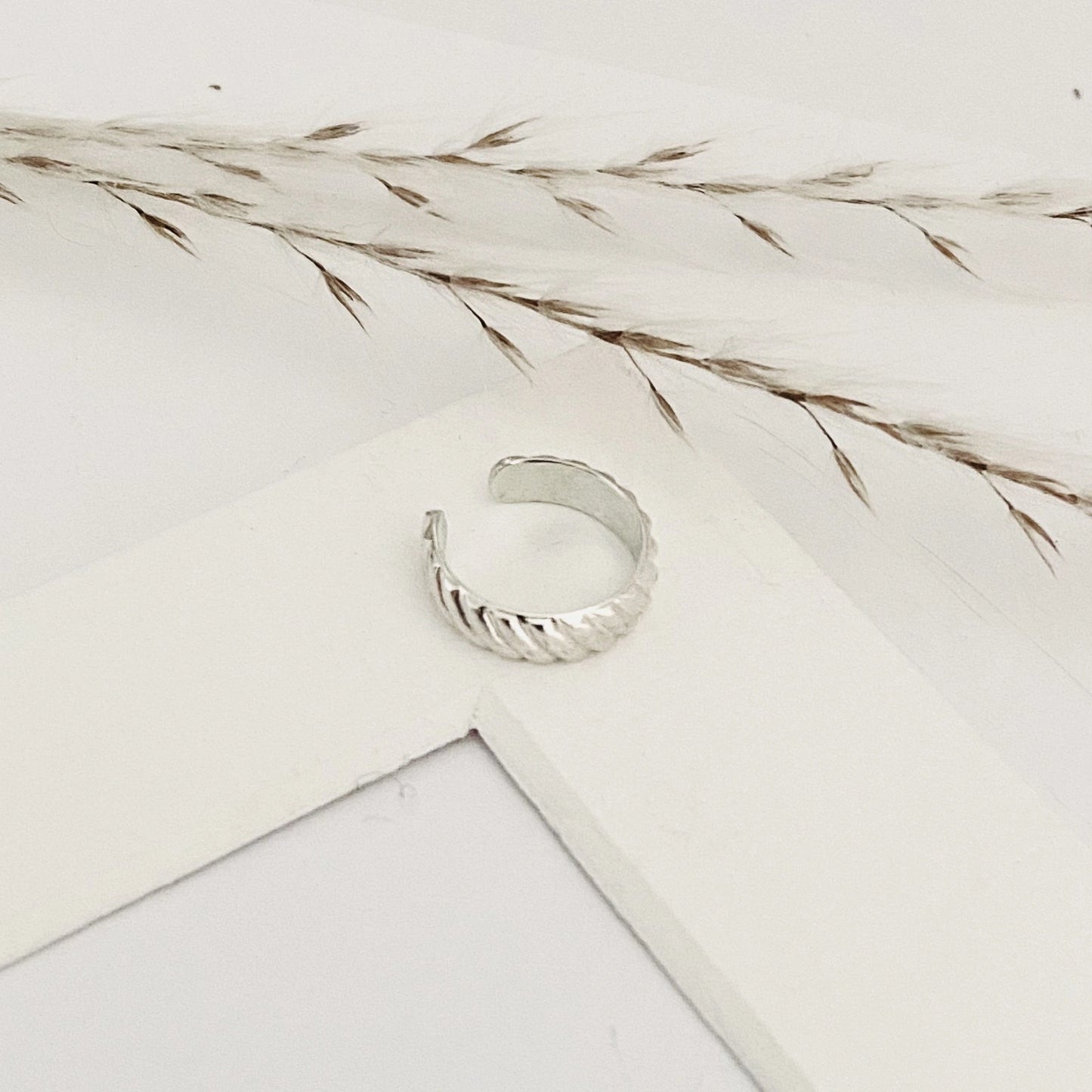 Luisana Jewelry Grace ear cuff in silver with a twisted design for stylish ear accessories