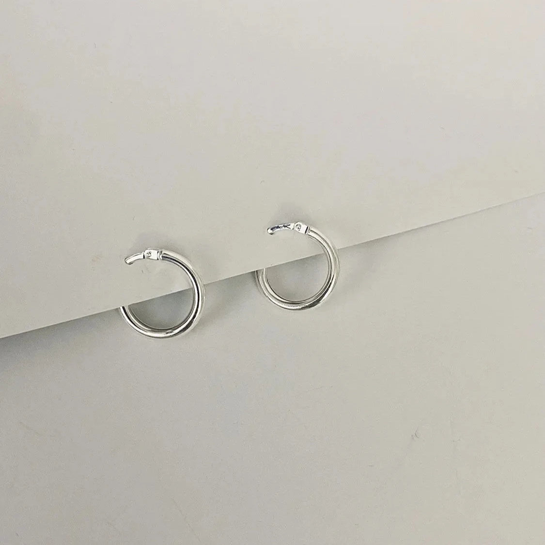 Silver Luisana Jewelry Lola Hoops Earrings on a minimalist background for elegant styles