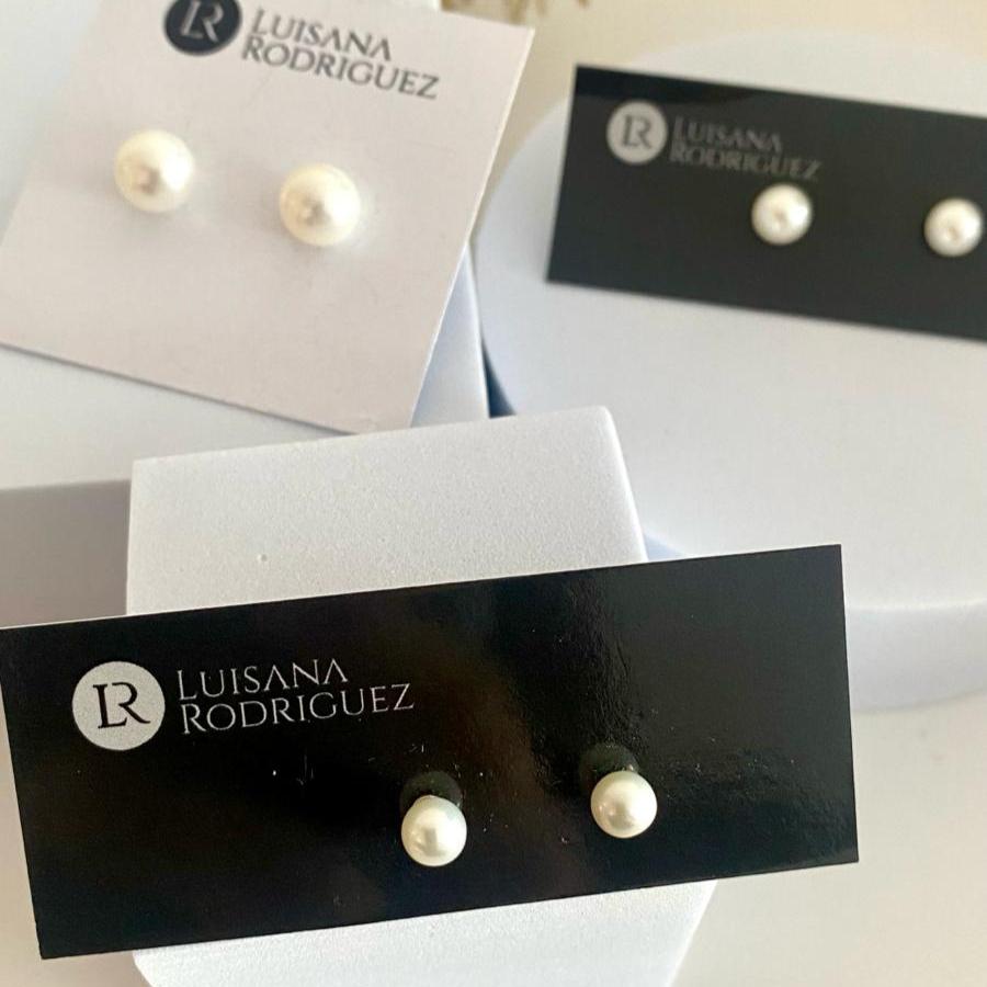 Luisana Jewelry Amelie Studs featuring elegant pearl design showcased on display cards