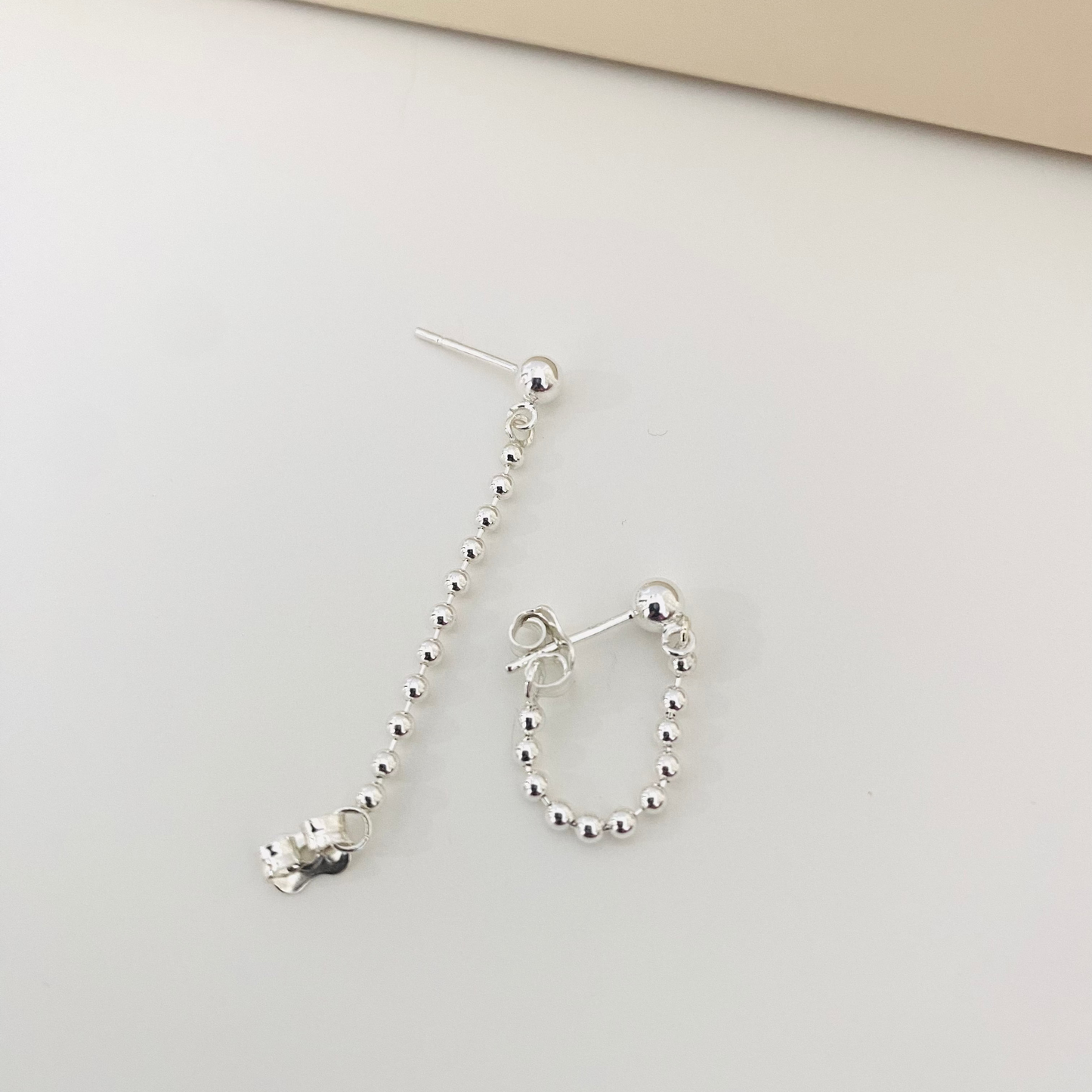 Luisana Jewelry Monique earrings with silver bead design and unique drop style