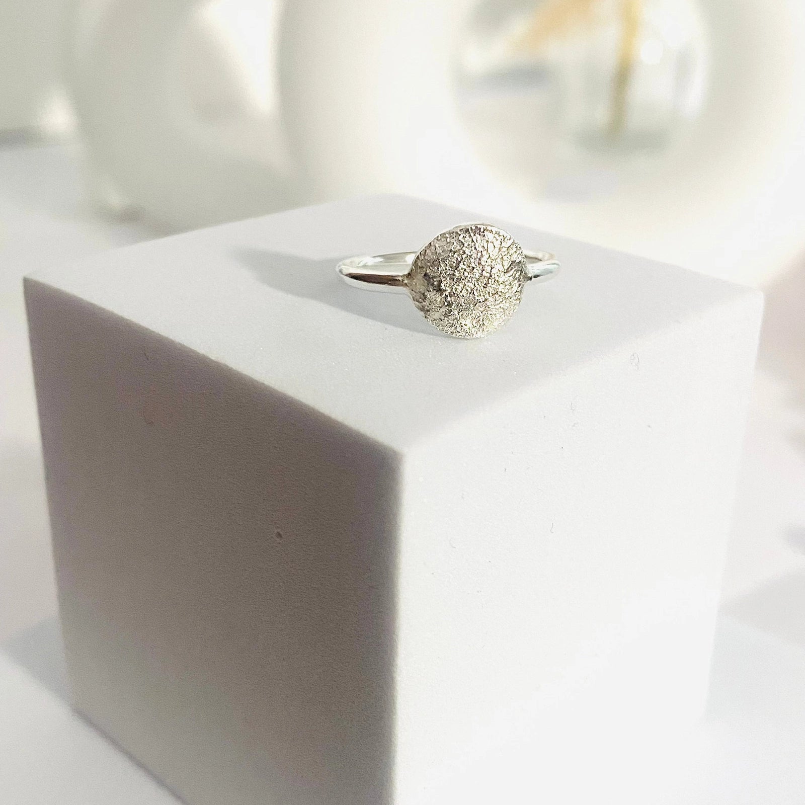 Luisana Jewelry Organic Love Ring with a textured design on a sleek silver band