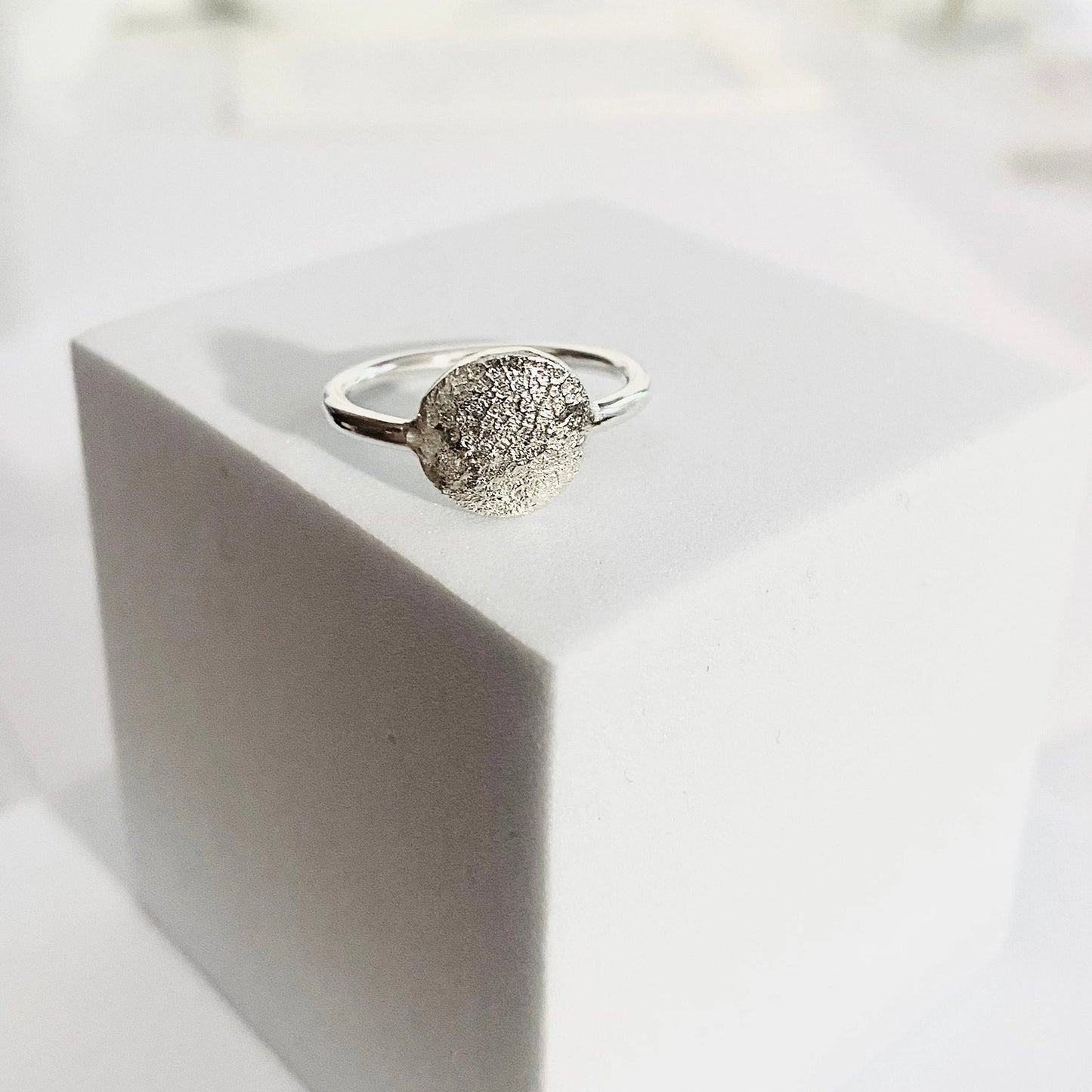 Luisana Jewelry Organic Love Ring featuring a textured design on a silver band