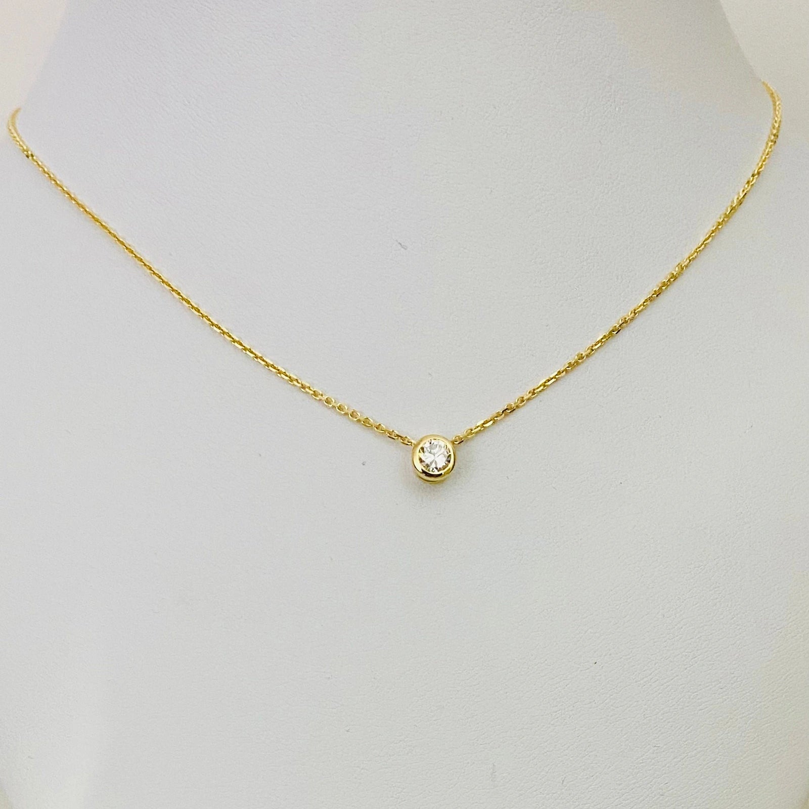 Luisana Jewelry Serene Necklace featuring a gold chain with a sparkling central pendant