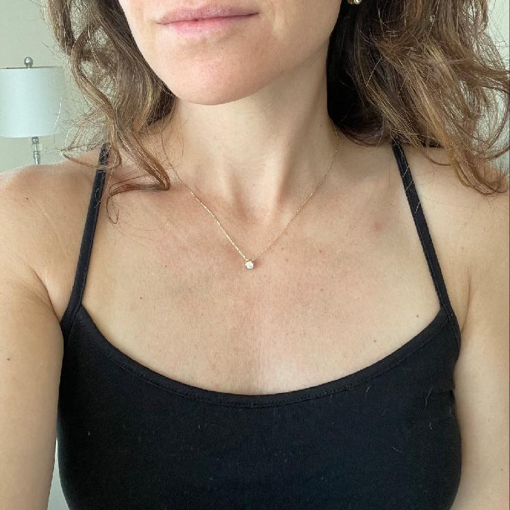 Elegant Serene Necklace from Luisana Jewelry showcased on a model's neckline