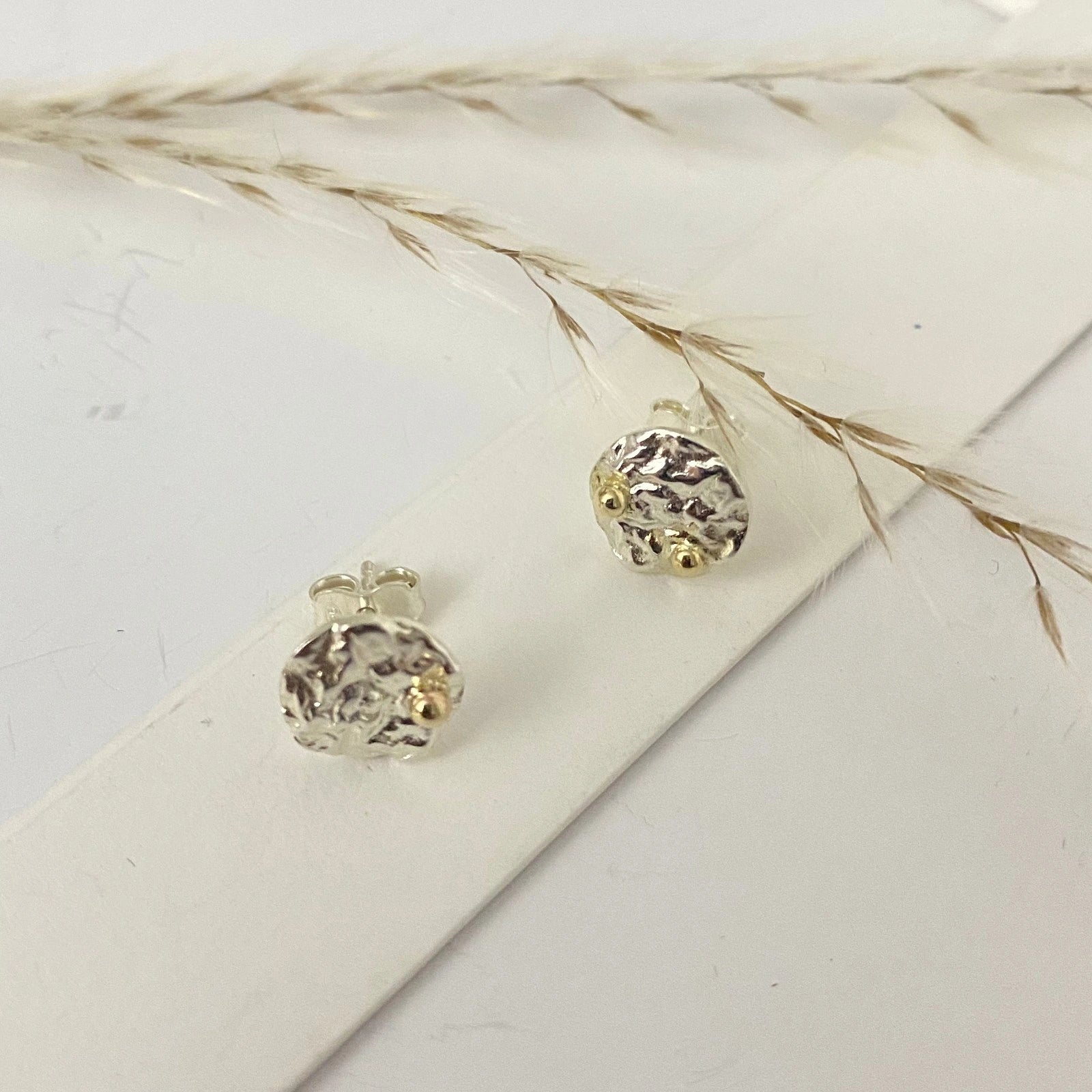 Luisana Jewelry Sunny Studs in silver with a textured design and gold accents for elegant style