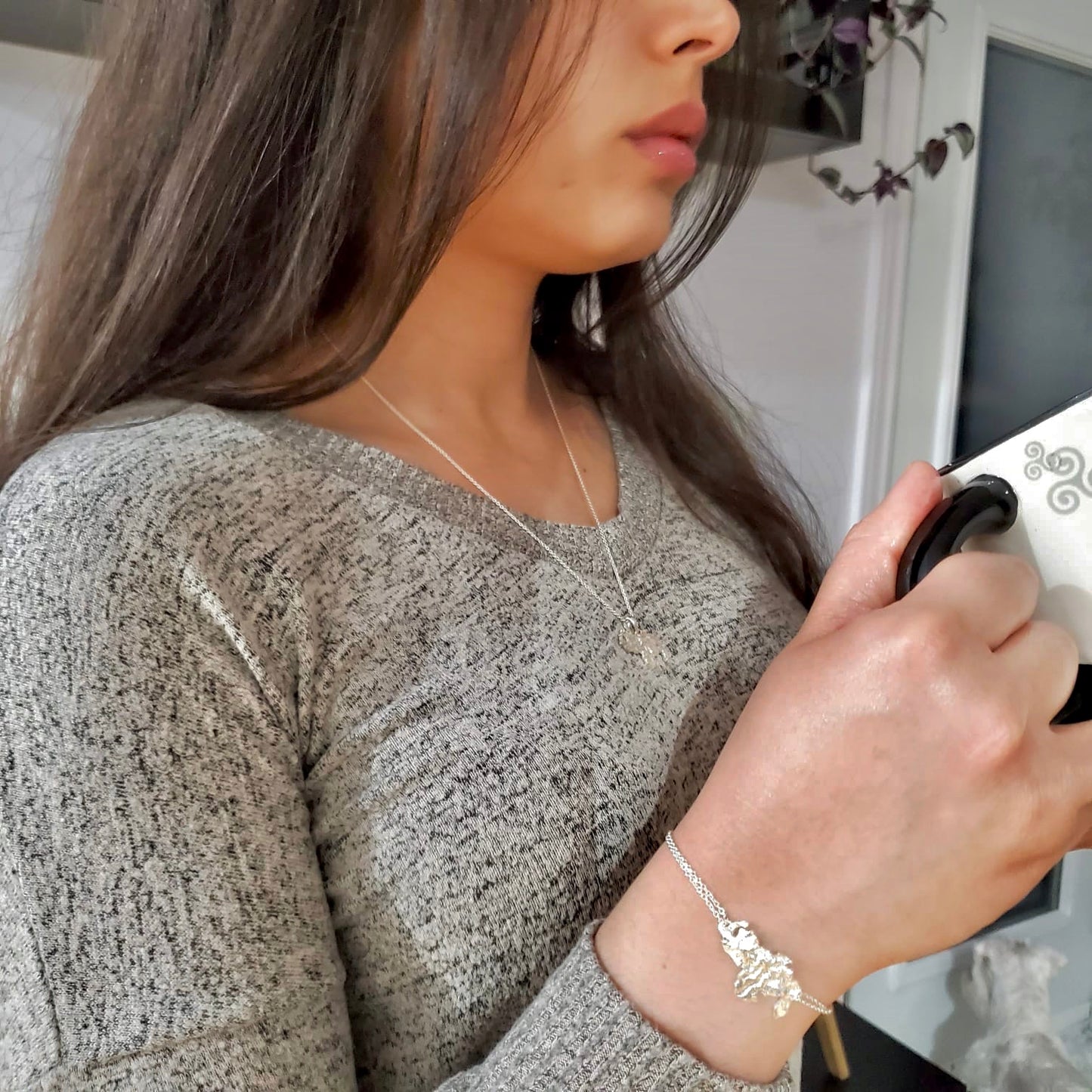 Stylish Luisana Jewelry Venezuela Bracelet Texture worn on a woman's wrist, showcasing intricate design details