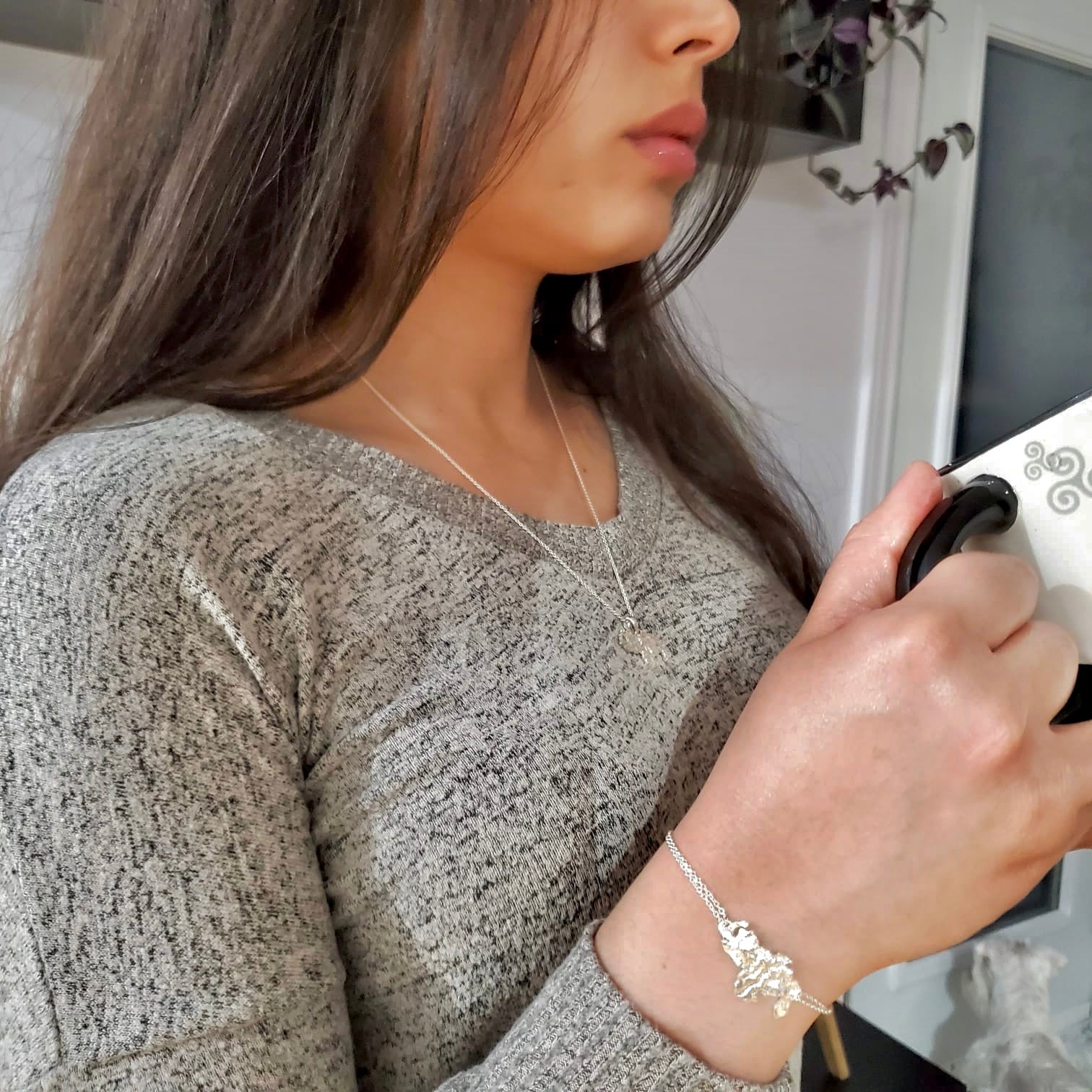 Stylish Luisana Jewelry Venezuela Bracelet Texture worn on a woman's wrist, showcasing intricate design details