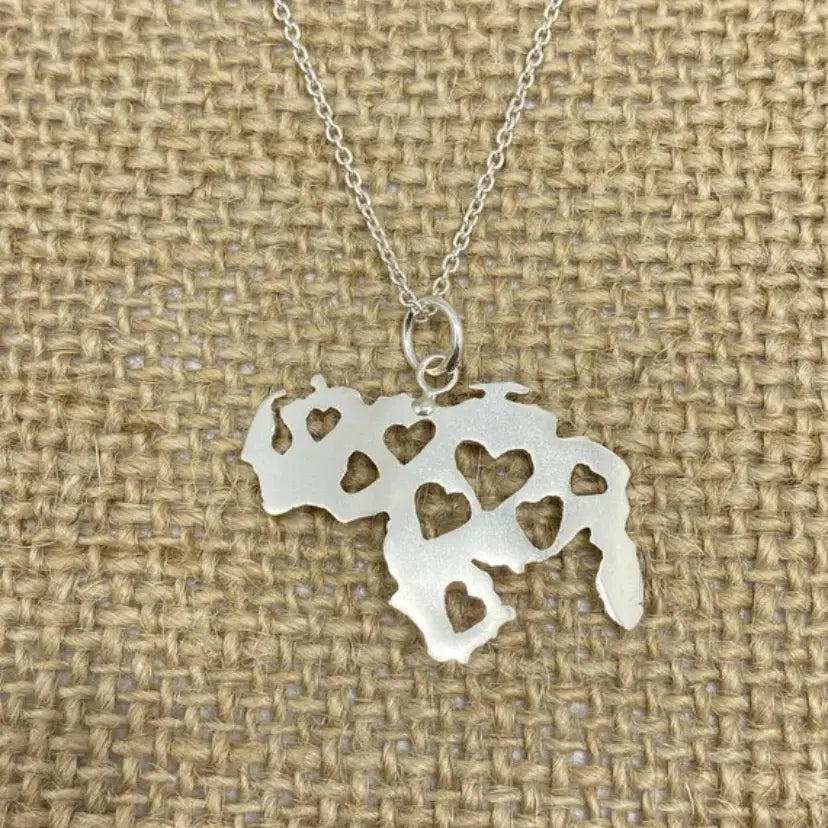 Luisana Jewelry Venezuela Necklace Hearts featuring a silver map design with heart cutouts