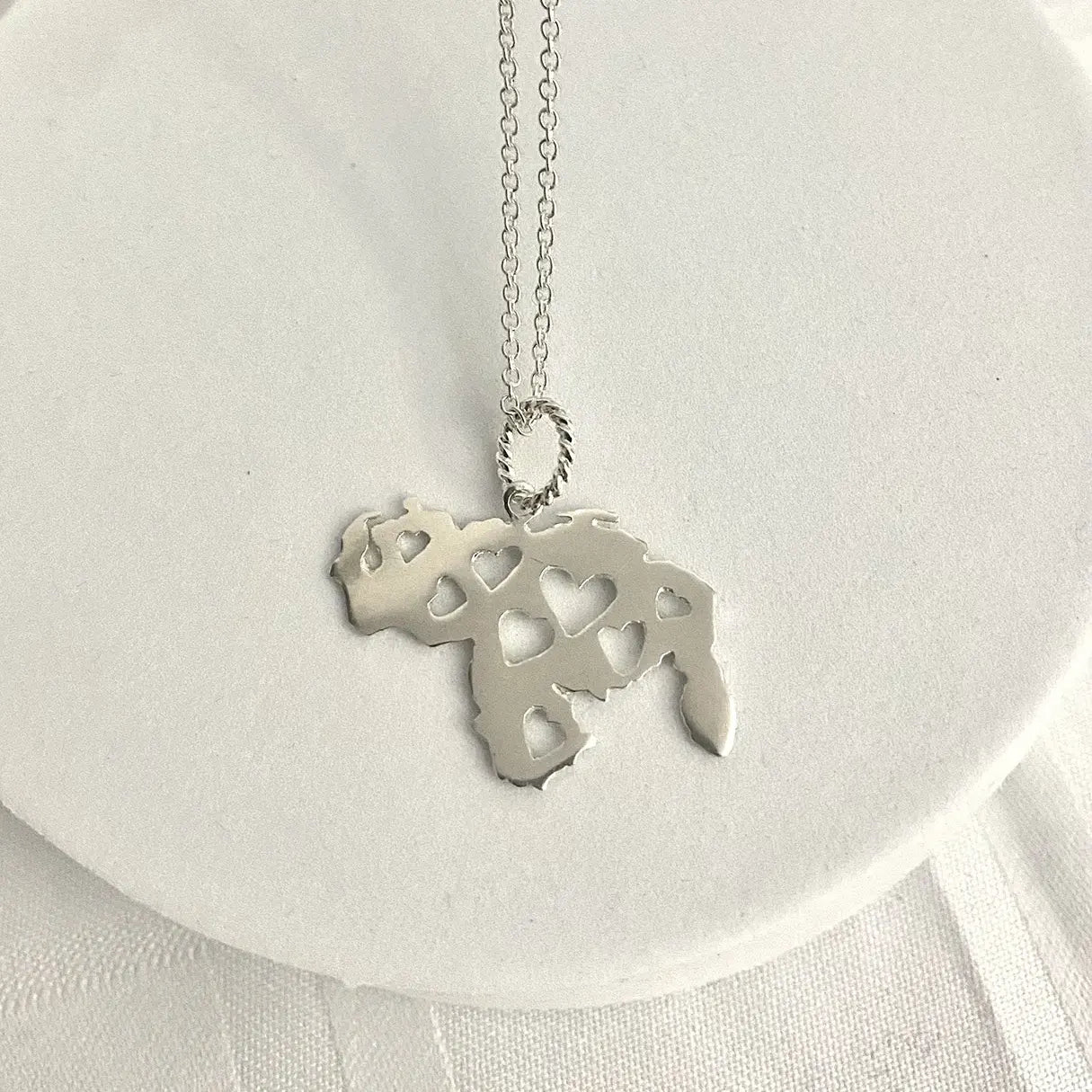 Venezuela Necklace Hearts in Silver with Heart Cutouts for a Unique Jewelry Statement